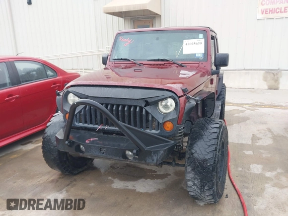 2007 Jeep Wrangler Unlimited Sahara with VIN 1J4GB59197L142223, listed as a IAAI auction lot 42025639 with 155,274 mi miles and . Bid and sale history available at DreamBid. Image 12.