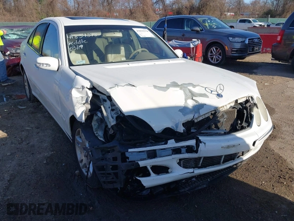 2005 Mercedes-Benz E-Class 3.2L CDI with VIN WDBUF26J75A615933, listed as a IAAI auction lot 41839378 with 124,135 mi miles. Bid and sale history available at carsss.com. Image 14.