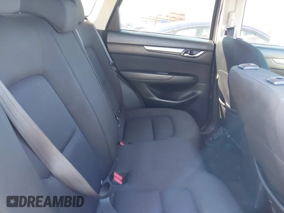 2019 Mazda CX-5 Sport with VIN JM3KFBBM2K0508743, listed as a IAAI auction lot 41288659 with 77,710 mi miles and . Bid and sale history available at DreamBid. Image 8.