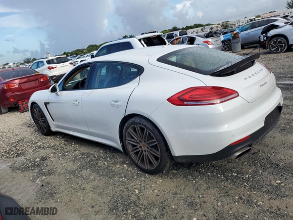2016 Porsche Panamera 4 with VIN WP0AA2A75GL002991, listed as a Copart auction lot 69493904 with 39,554 mi miles and Salvage Title. Bid and sale history available at carsss.com. Image 2.