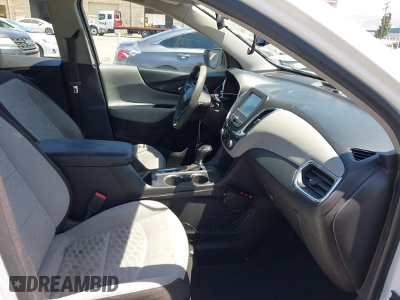 2018 Chevrolet Equinox LS with VIN 2GNAXHEV2J6230139, listed as a IAAI auction lot 42175875 with 124,173 mi miles and . Bid and sale history available at DreamBid. Image 5.
