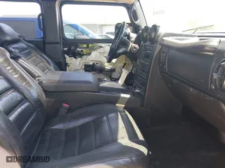 2005 Hummer H2 SUV with VIN 5GRGN23U25H128791, listed as a IAAI auction lot 42115436 with 286,818 mi miles. Bid and sale history available at carsss.com. Image 5.