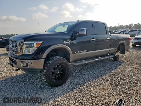 2017 Nissan Titan Platinum Reserve with VIN 1N6BA1F43HN568650, listed as a Copart auction lot 59593525 with 126,193 mi miles and Salvage title. Bid and sale history available at DreamBid. Image 1.