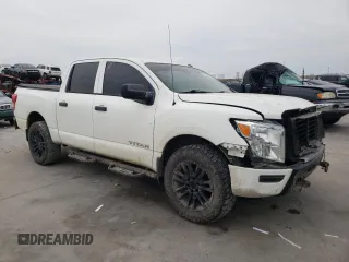 2021 Nissan Titan SV with VIN 1N6AA1EC2MN506607, listed as a Copart auction lot 57905485 with 68,690 mi miles and Salvage title. Bid and sale history available at DreamBid. Image 4.