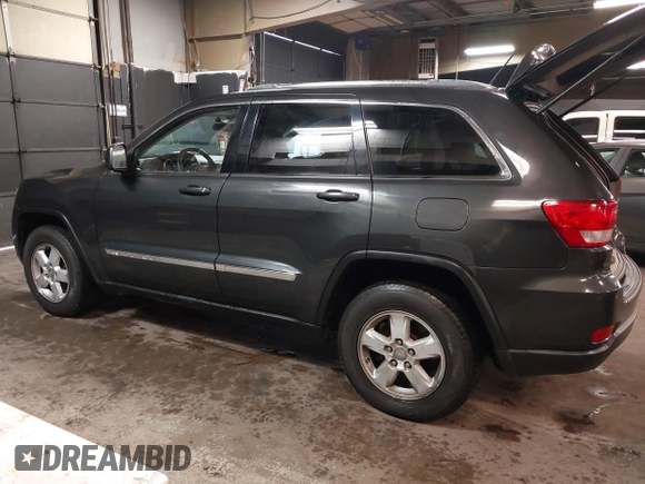 2011 Jeep Grand Cherokee 70th Anniversary with VIN 1J4RR4GG3BC566690, listed as a IAAI auction lot 41810545 with 173,886 mi miles. Bid and sale history available at carsss.com. Image 3.