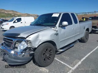 1999 Ford F-150 XL with VIN 1FTRX17L3XKB76368, listed as a IAAI auction lot 41959746 with Not Provided miles. Bid and sale history available at carsss.com. Image 2.