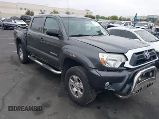 2013 Toyota Tacoma PreRunner z VIN 3TMJU4GN4DM149550, wystawiony jako IAAI lot #42086073 z przebiegiem 120 668 mil mil oraz . Historia ofert i sprzedaży dostępna na DreamBid. Obrazek 1.