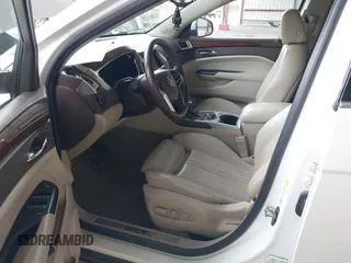 2015 Cadillac SRX Luxury Collection with VIN 3GYFNEE30FS567431, listed as a IAAI auction lot 42118084 with 140,778 mi miles. Bid and sale history available at carsss.com. Image 5.