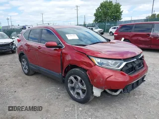 2018 Honda CR-V EX-L z VIN 2HKRW2H89JH606171, wystawiony jako IAAI lot #42291219 z przebiegiem 94 594 mil mil oraz . Historia ofert i sprzedaży dostępna na DreamBid. Obrazek 1.