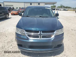 2013 Dodge Journey American Value with VIN 3C4PDCAB1DT650629, listed as a Copart auction lot 62072965 with 87,674 mi miles and Salvage title. Bid and sale history available at DreamBid. Image 5.