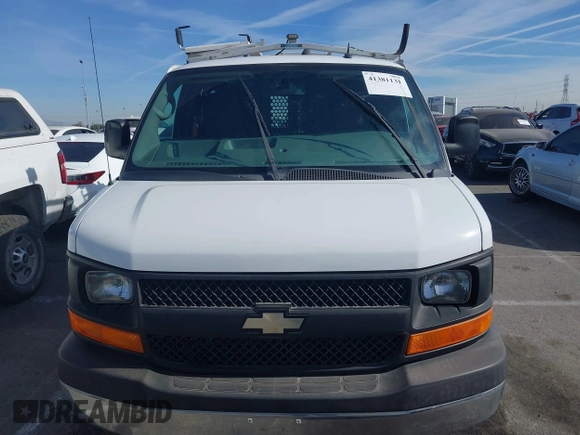 2014 Chevrolet Express Cargo Van with VIN 1GCWGFCB2E1122236, listed as a IAAI auction lot 41381131 with 70,696 mi miles. Bid and sale history available at carsss.com. Image 6.
