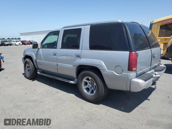 1999 GMC Denali z VIN 1GKEK13R6XR914411, wystawiony jako Copart lot #56063555 z przebiegiem 231 344 mil mil oraz Szkoda całkowita • Salvage title. Historia ofert i sprzedaży dostępna na DreamBid. Obrazek 2.