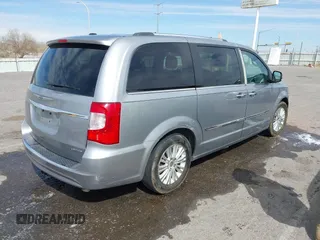 2013 Chrysler Town & Country Limited with VIN 2C4RC1GGXDR548106, listed as a IAAI auction lot 41890220 with 189,908 mi miles. Bid and sale history available at carsss.com. Image 4.