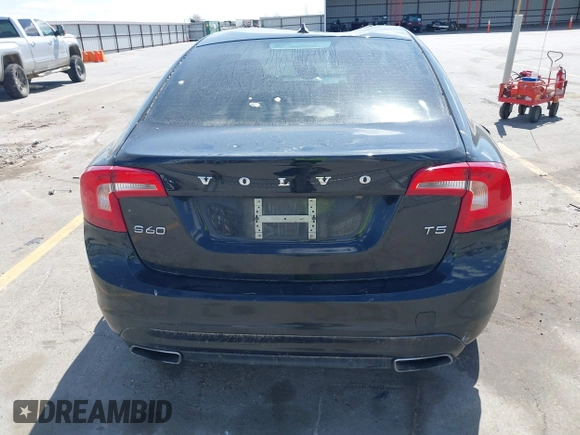 2016 Volvo S60 T5 Drive-E Premier z VIN YV126MFK5G1398229, wystawiony jako IAAI lot #42039229 z przebiegiem 99 604 mil mil oraz . Historia ofert i sprzedaży dostępna na DreamBid. Obrazek 16.