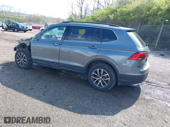 2019 Volkswagen Tiguan SE with VIN 3VV2B7AX5KM198454, listed as a IAAI auction lot 42033410 with 64,381 mi miles and . Bid and sale history available at DreamBid. Image 3.