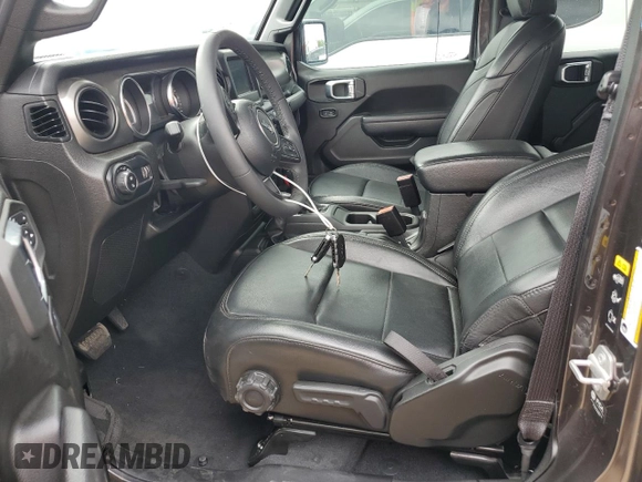 2023 Jeep Gladiator Freedom с VIN 1C6HJTAG5PL562148, выставлен на аукционе Copart как лот 53253005 с пробегом 18 076 миль миль и Списание • Salvage title. История ставок и продаж доступна на DreamBid. Изображение 7.