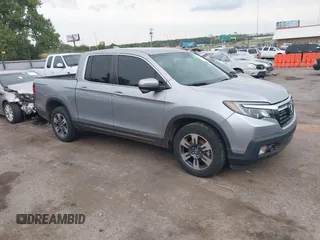 2018 Honda Ridgeline RTL-T with VIN 5FPYK3F63JB004340, listed as a IAAI auction lot 40248607 with 69,727 mi miles and . Bid and sale history available at DreamBid. Image 1.
