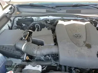 2022 Toyota Tacoma SR z VIN 3TYSZ5AN0NT080091, wystawiony jako Copart lot #70502085 z przebiegiem 72 221 mil mil oraz Szkoda całkowita • Salvage title. Historia ofert i sprzedaży dostępna na DreamBid. Obrazek 14.
