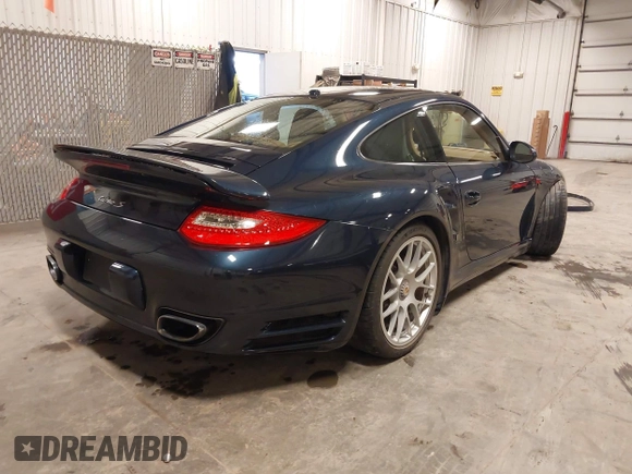 2011 Porsche 911 Turbo with VIN WP0AD2A93BS766801, listed as a IAAI auction lot 41566167 with 66,785 mi miles. Bid and sale history available at carsss.com. Image 4.