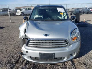 2012 MINI Countryman with VIN WMWZB3C59CWM05749, listed as a IAAI auction lot 38329304 with 64,590 mi miles and . Bid and sale history available at DreamBid. Image 12.