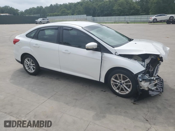 2015 Ford Focus SE with VIN 1FADP3F21FL246821, listed as a Copart auction lot 59732635 with 135,752 mi miles and Salvage title. Bid and sale history available at DreamBid. Image 4.