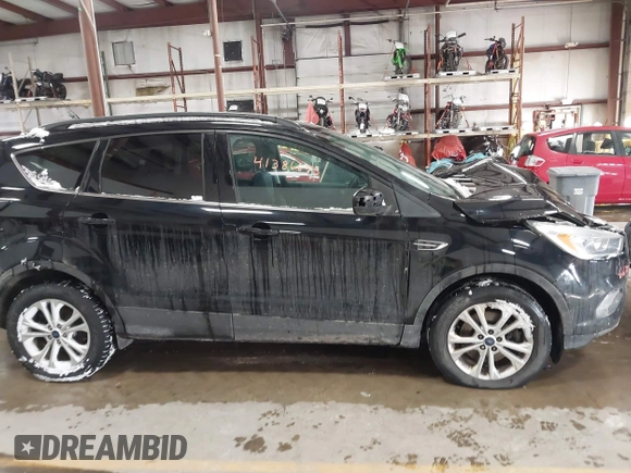 2017 Ford Escape SE with VIN 1FMCU9GD8HUE81307, listed as a IAAI auction lot 41386675 with 133,821 mi miles and . Bid and sale history available at DreamBid. Image 13.