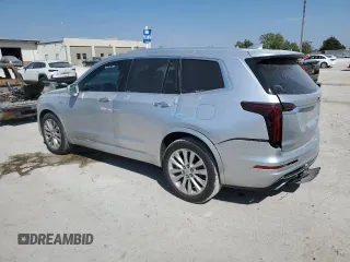 2020 Cadillac XT6 FWD Premium Luxury with VIN 1GYKPCRSXLZ122143, listed as a Copart auction lot 70799484 with 87,962 mi miles and Salvage Title. Bid and sale history available at carsss.com. Image 2.