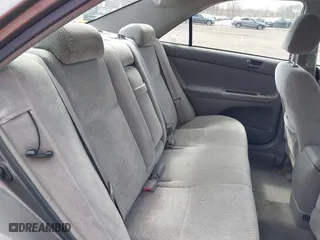 2004 Toyota Camry LE with VIN 4T1BE32K04U853924, listed as a IAAI auction lot 42114407 with 246,272 mi miles. Bid and sale history available at carsss.com. Image 8.