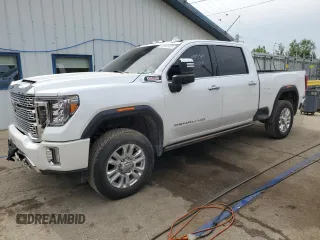 2022 GMC Sierra 2500HD Denali z VIN 1GT49REYXNF247430, wystawiony jako Copart lot #69941424 z przebiegiem 67 538 mil mil oraz Czysty tytuł • Clean title. Historia ofert i sprzedaży dostępna na DreamBid. Obrazek 1.