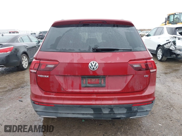 2018 Volkswagen Tiguan S with VIN 3VV1B7AX8JM124827, listed as a IAAI auction lot 41544321 with 101,492 mi miles and . Bid and sale history available at DreamBid. Image 16.