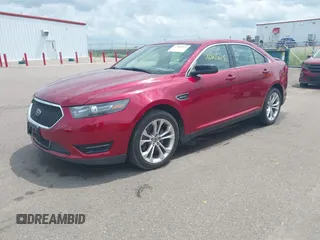 2014 Ford Taurus SHO with VIN 1FAHP2KT1EG133940, listed as a IAAI auction lot 42805214 with 141,204 mi miles and . Bid and sale history available at DreamBid. Image 2.