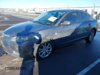 2007 Mazda 3 i Touring with VIN JM1BK32F471662609, listed as a IAAI auction lot 41658970 with 132,786 mi miles and . Bid and sale history available at DreamBid. Image 2.