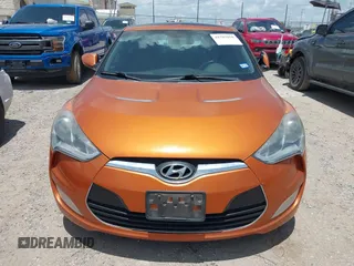 2013 Hyundai Veloster w/Black Int with VIN KMHTC6AD0DU147017, listed as a IAAI auction lot 42707858 with 115,130 mi miles and . Bid and sale history available at DreamBid. Image 6.