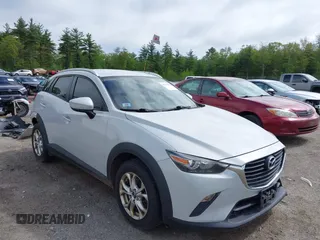 2017 Mazda CX-3 Sport z VIN JM1DKFB78H0146215, wystawiony jako IAAI lot #42233175 z przebiegiem 128 173 mil mil oraz . Historia ofert i sprzedaży dostępna na DreamBid. Obrazek 1.
