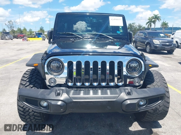 2016 Jeep Wrangler Unlimited Sport z VIN 1C4BJWDG4GL327638, wystawiony jako IAAI lot #42494615 z przebiegiem 139 371 mil mil oraz . Historia ofert i sprzedaży dostępna na DreamBid. Obrazek 6.