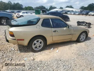 1984 Porsche 944 z VIN WP0AA0940EN458560, wystawiony jako Copart lot #59191935 z przebiegiem 85 420 mil mil oraz Czysty tytuł • Clean title. Historia ofert i sprzedaży dostępna na DreamBid. Obrazek 3.