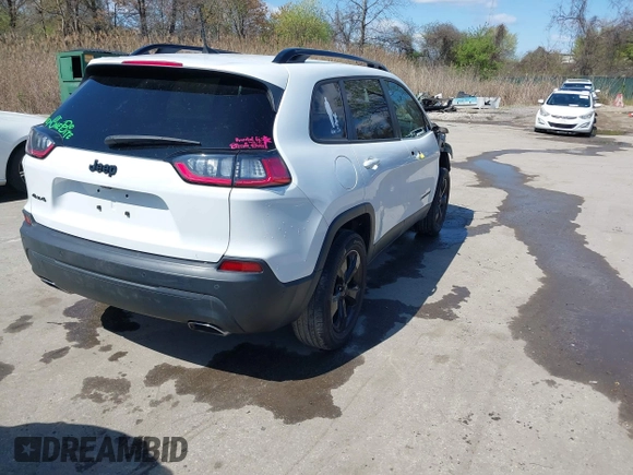 2020 Jeep Cherokee Altitude with VIN 1C4PJMLN7LD554191, listed as a IAAI auction lot 41975413 with 55,923 mi miles. Bid and sale history available at carsss.com. Image 4.