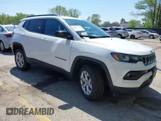 2024 Jeep Compass Latitude with VIN 3C4NJDBN0RT109268, listed as a IAAI auction lot 42067387 with 26,894 mi miles. Bid and sale history available at carsss.com. Image 1.