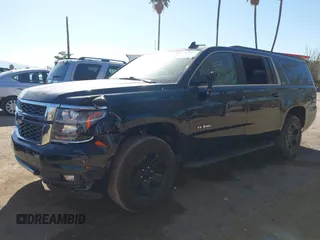 2020 Chevrolet Suburban LT with VIN 1GNSKHKC5LR303081, listed as a IAAI auction lot 41896511 with 60,121 mi miles and . Bid and sale history available at DreamBid. Image 2.