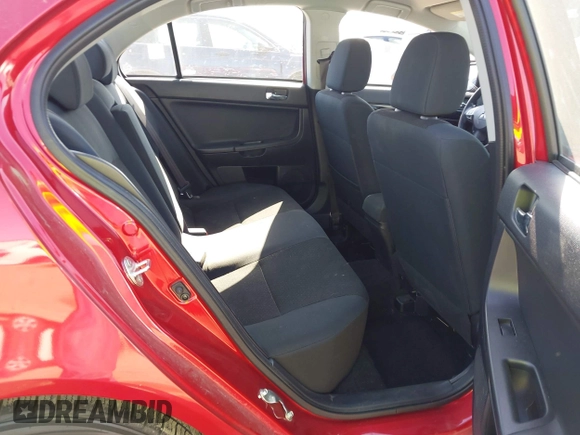 2016 Mitsubishi Lancer ES z VIN JA32U2FU3GU001857, wystawiony jako IAAI lot #41999674 z przebiegiem 65 520 mil mil oraz . Historia ofert i sprzedaży dostępna na DreamBid. Obrazek 8.