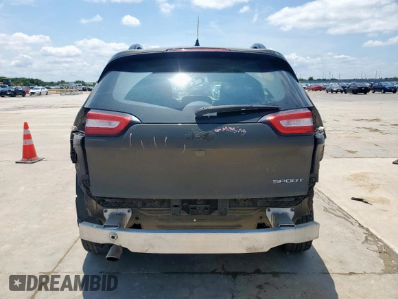 2015 Jeep Cherokee Sport with VIN 1C4PJLAB5FW684191, listed as a Copart auction lot 64256405 with 159,289 mi miles and Salvage title. Bid and sale history available at DreamBid. Image 6.