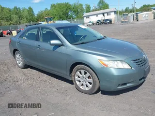 2007 Toyota Camry LE z VIN 4T1BK46KX7U538870, wystawiony jako IAAI lot #42299023 z przebiegiem 148 782 mil mil oraz . Historia ofert i sprzedaży dostępna na DreamBid. Obrazek 1.