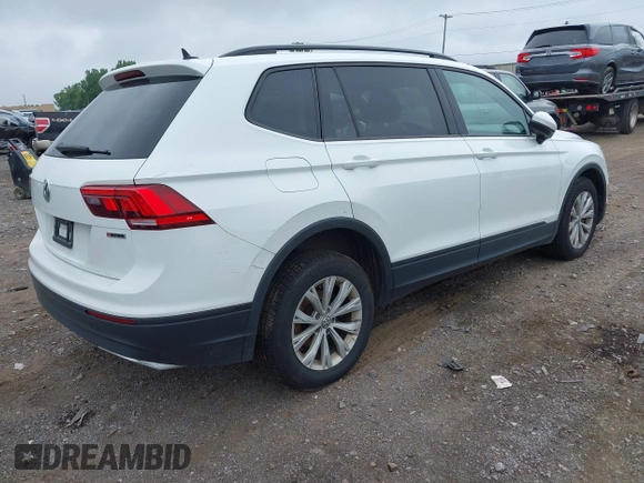 2020 Volkswagen Tiguan S with VIN 3VV0B7AX0LM140910, listed as a IAAI auction lot 42622385 with 80,998 mi miles and . Bid and sale history available at DreamBid. Image 4.