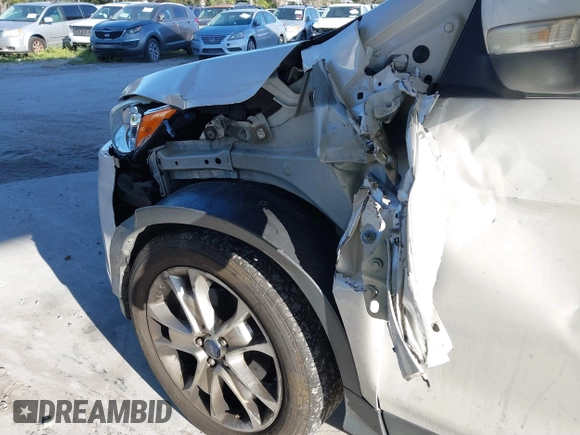 2015 Ford Escape Titanium with VIN 1FMCU0J96FUA48615, listed as a IAAI auction lot 39482355 with 186,340 mi miles and . Bid and sale history available at DreamBid. Image 13.