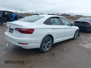 2021 Volkswagen Jetta S z VIN 3VWC57BUXMM017430, wystawiony jako IAAI lot #41947038 z przebiegiem 50 277 mil mil oraz . Historia ofert i sprzedaży dostępna na DreamBid. Obrazek 4.
