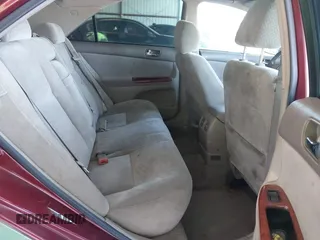 2002 Toyota Camry LE z VIN 4T1BE30K02U096796, wystawiony jako IAAI lot #42230108 z przebiegiem 249 883 mil mil oraz . Historia ofert i sprzedaży dostępna na DreamBid. Obrazek 8.