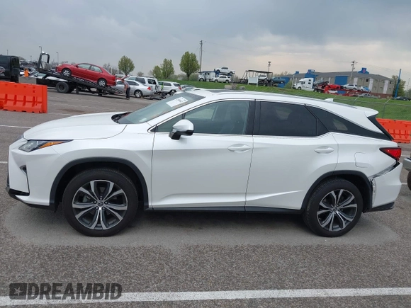 2019 Lexus RX 350L Premium with VIN JTJDZKCA5K2018635, listed as a IAAI auction lot 42008042 with 60,263 mi miles and . Bid and sale history available at DreamBid. Image 14.