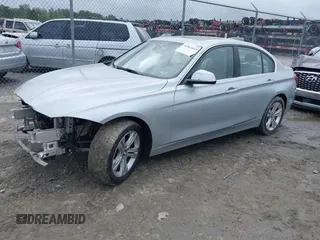 2017 BMW 3 Series 330i with VIN WBA8B9G38HNU56566, listed as a IAAI auction lot 41961845 with 63,353 mi miles. Bid and sale history available at carsss.com. Image 2.