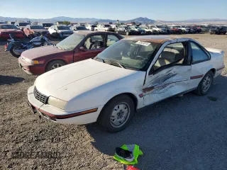 1990 Chevrolet Beretta z VIN 1G1LW14T1LE136918, wystawiony jako Copart lot #72023874 z przebiegiem 71 009 mil mil oraz Czysty tytuł • Clean title. Historia ofert i sprzedaży dostępna na DreamBid. Obrazek 1.