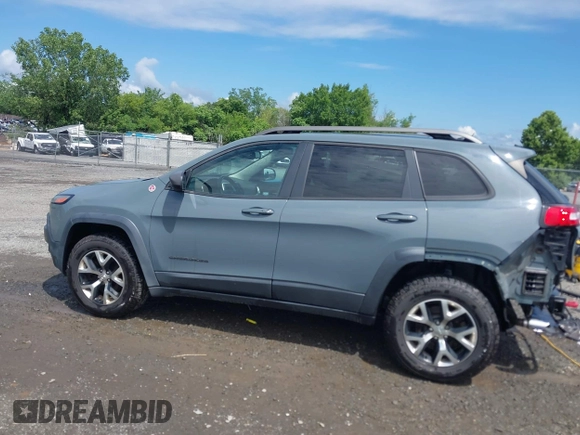2014 Jeep Cherokee Trailhawk z VIN 1C4PJMBS4EW236950, wystawiony jako IAAI lot #42636128 z przebiegiem 170 491 mil mil oraz . Historia ofert i sprzedaży dostępna na DreamBid. Obrazek 15.